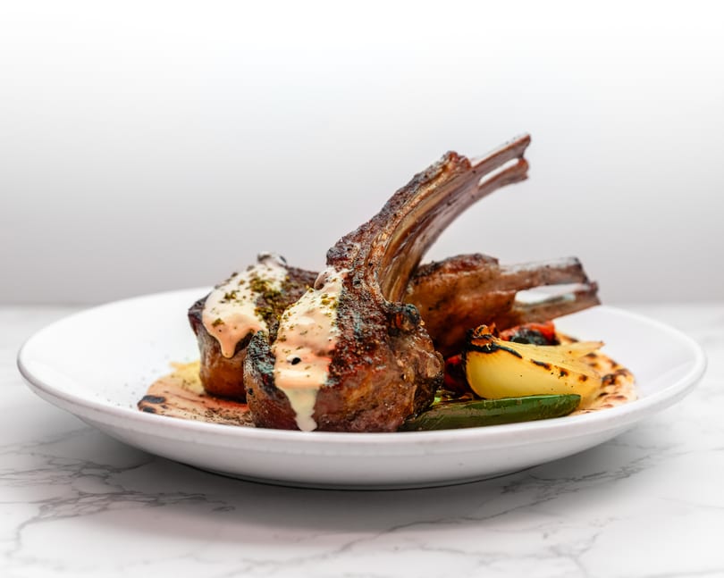 Beautifully plated lamb chops at Cracked Pepper Bistro.